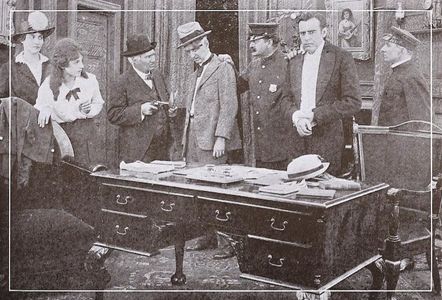 Marguerite Courtot and Richard Purdon in The Rogue Syndicate (1915)