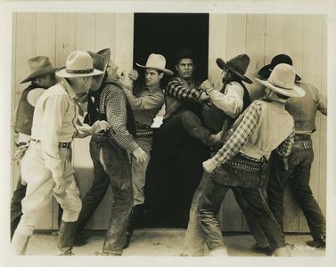 C.V. Bussey, Jim Corey, Tracy Layne, Cliff Lyons, Ken Maynard, Bud McClure, Lew Meehan, Nat Pendleton, and Jack Perrin i