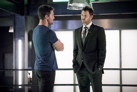 Wil Traval and Stephen Amell in Arrow (2012)