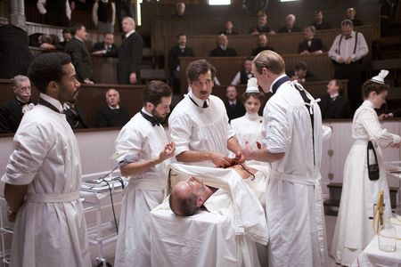 Andre Holland, Michael Angarano, Clive Owen, Louis Butelli, Eve Hewson, Jeremy Bobb, and Cait Cortelyou in 