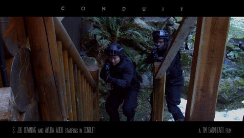 S. Joe Downing and Ayuba Audu in Conduit (2017)