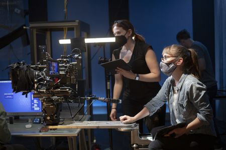 Erin directing on 