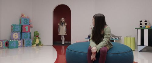Amie Donald and Violet McGraw in M3GAN (2022)