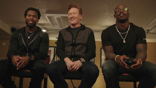 Conan O'Brien, Von Miller, and Josh Norman in Conan (2010)