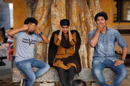 Jacob Gregory, Dulquer Salmaan, and Aishwarya Rajesh in Jomon's Gospels (2017)