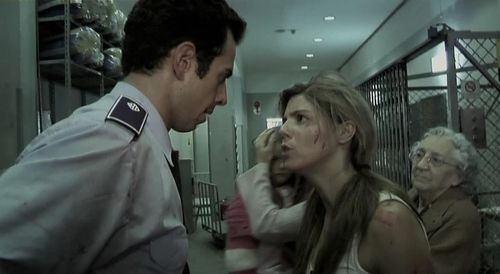 Manuela Velasco, María Teresa Ortega, Jorge-Yamam Serrano, and Claudia Silva in REC (2007)