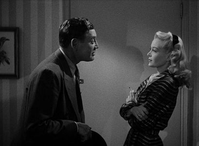 Richard Dix, Helen Mowery, and Nina Vale in Mysterious Intruder (1946)