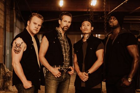 Garfield Wilson, Nelson Leis, Ryan Cowie, and Curtis Lum in A.T.A.C.K (2022)