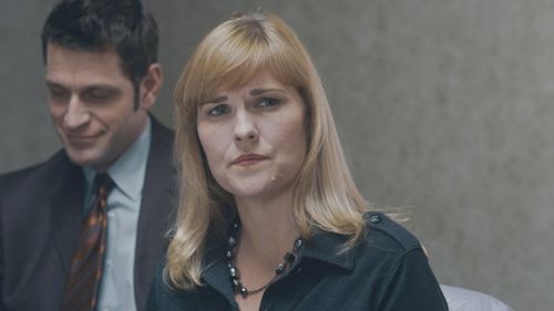 Peter Hermann and Kelly McAndrew in In the Family (2011)