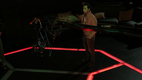 Director Aziz Tazi is pensive on a night club set in Morocco.