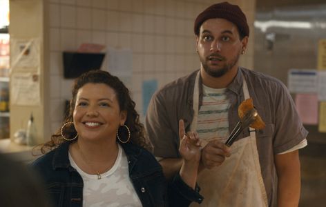 Justina Machado and Alejandro Hernandez in The Horror of Dolores Roach (2023)