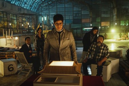 Yoo Ji-tae, Nairobi, Lee Won-Jong, Jang Yoon-ju, Moscow, Ji Hun Kim, Denver, and Park Hae-soo in Money Heist: Korea - Jo