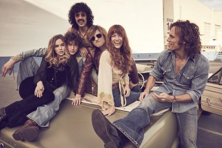 Riley Keough, Sam Claflin, Suki Waterhouse, Sebastian Chacon, and Daisy Jones in Daisy Jones & The Six (2023)