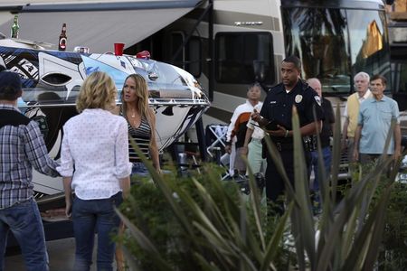 Elimu Nelson, Fred Willard, and Andrea Anders in Modern Family (2009)