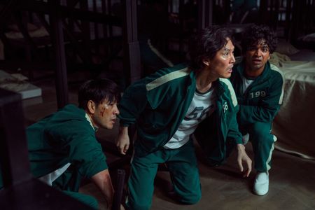 Lee Jung-jae, Anupam Tripathi, and Park Hae-soo in Squid Game (2021)