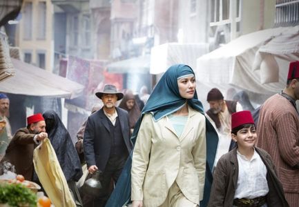 Still shot from The Water Diviner Russell Crowe (left),Olga Kurylenko (center),Dylan Georgiades (right)