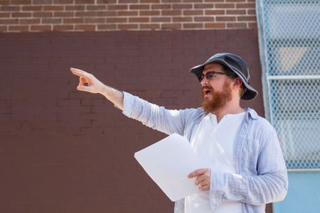 On the set of MANDATED, Director Jesse R. Tendler in action at the 