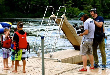 Directors of Photography Miguel Drake-McLaughlin and Rufus Lusk capture the campers negotiating their entrance into the 