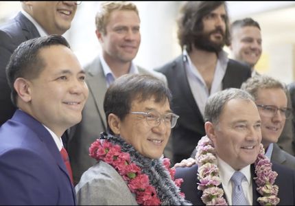 Receiving the Global Shield Awards with Jackie Chan and Utah Attorney General.