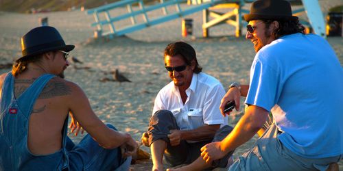 Director Jameson Stafford goes over the beach scene with Sean Penn & Kid Rock while shooting 