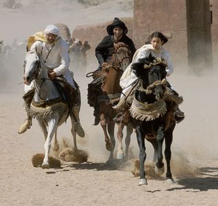 Neera (Biana Tamimi, right) rides hard on Shetan against Mansoor (Ali Al Ameri, center) and Rhamon (Gerard Rudolf, left)