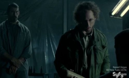 Heavy (Robert Maillet) and Sinister Man (Kyle Mitchell) hold Police Chief, Dwight Hendrickson (Adam Copeland) captive. H