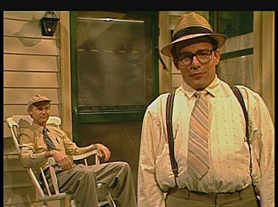 A. Whitney Brown and Phil Hartman in Saturday Night Live (1975)