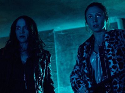 Melanie Scrofano and Dominique Provost-Chalkley in Wynonna Earp (2016)