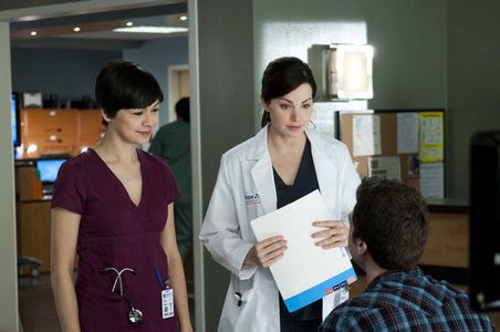 Erica Durance and Julia Chan in Saving Hope (2012)