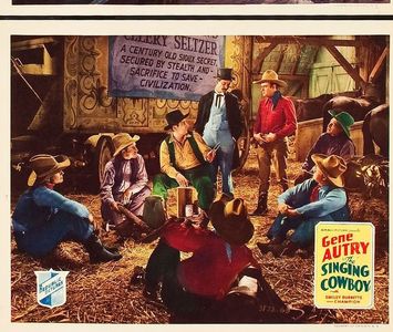Gene Autry, Smiley Burnette, Art Davis, Earle Hodgins, Jack Kirk, Frankie Marvin, and Wes Warner in The Singing Cowboy (