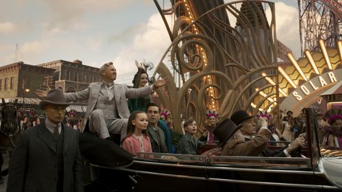Michael Keaton, Colin Farrell, Douglas Reith, Eva Green, Joseph Gatt, Finley Hobbins, and Nico Parker in Dumbo (2019)