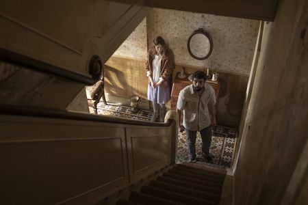 Alec Secareanu and Carla Juri in Amulet (2020)