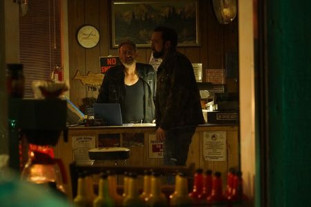 with Nicholas cage in Looking Glass