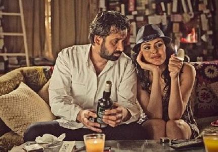 Karim Abdel Aziz and Dareen Haddad in The Blue Elephant (2014)