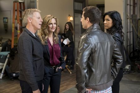 Greg Germann, Andy Samberg, Kelly Sullivan, and Stephanie Beatriz in Brooklyn Nine-Nine (2013)