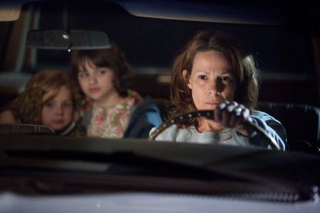 Lili Taylor, Joey King, and Kyla Deaver in The Conjuring (2013)