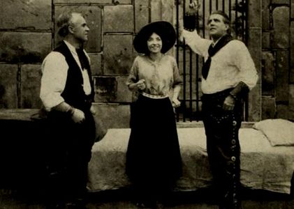 Pauline Bush and Jack Richardson in The Marked Gun (1912)