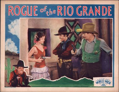 Myrna Loy, José Bohr, and Walter Miller in Rogue of the Rio Grande (1930)
