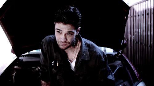 Travis Laughlin as Vince in 