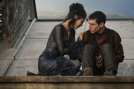 Claudia Kim and Ezra Miller in Fantastic Beasts: The Crimes of Grindelwald (2018)