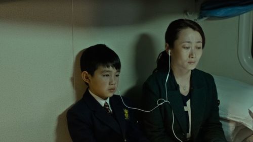Tao Zhao and Zishan Rong in Mountains May Depart (2015)