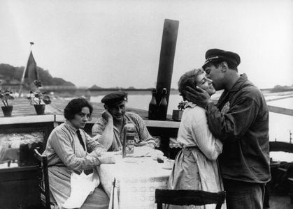 Pierre Alcover, Maguy Deliac, Louis Ravet, and Jane Maylianes in The Swallow and the Titmouse (1924)