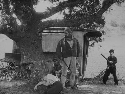 Charles Chaplin, Eric Campbell, Fred Goodwins, and Edna Purviance in The Vagabond (1916)