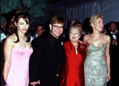 Elizabeth Hurley, Sharon Stone, Elton John, and Mathilde Krim