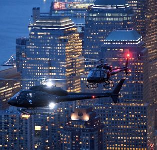 Nikon, National Geographic. Helicopter over Manhattan skyline, NYC. Kachina Dechert, Stuntwoman