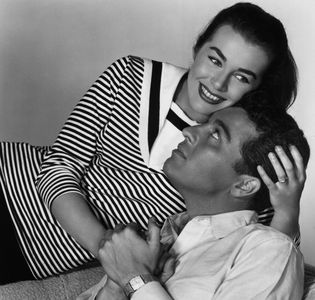 Sydney Chaplin and Marianne Koch in Four Girls in Town (1957)