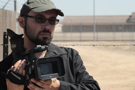 Filmmaker Yoav Potash at a California prison during the production of his award-winning documentary 