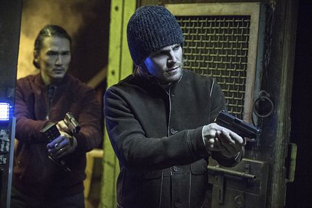 Karl Yune and Stephen Amell in Arrow (2012)