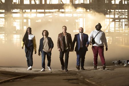 Jean-Claude Van Damme, Samir Decazza, Alban Ivanov, Assa Sylla, and Djimo in The Last Mercenary (2021)