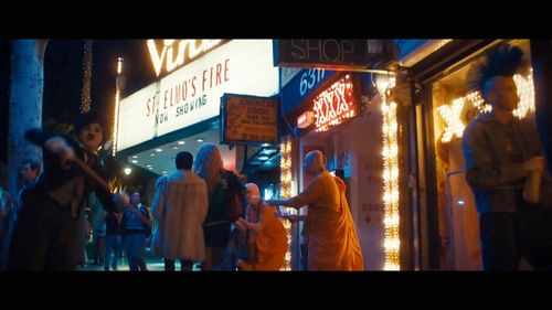 Allen Waiserman (as a Charlie Chaplin Impersonator),Mia Goth, & Halsey appear in a scene from MaXXXine from A24.